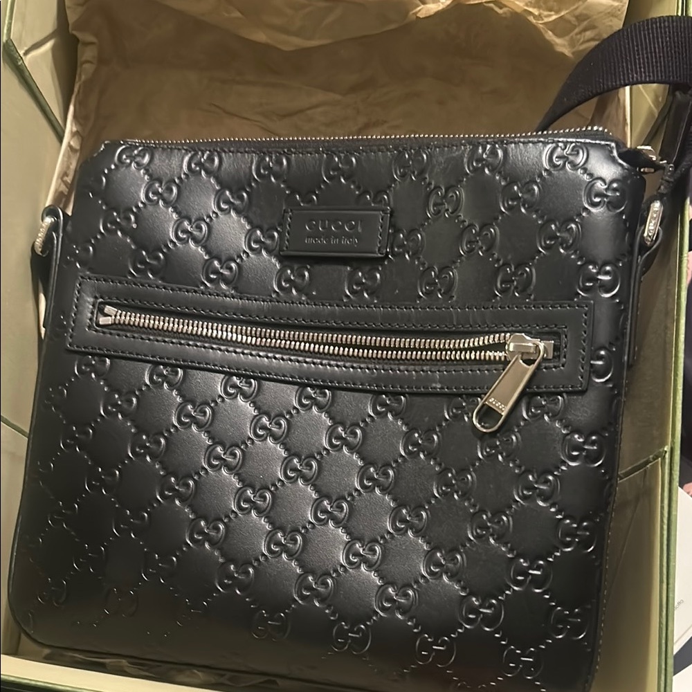 Gucci Black Messenger Bag with Embossed GG Pattern